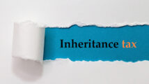 Inheritance Tax Written Under White Torn Paper