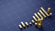 Golden financial chart stacks of gold coins on dark navy floor with a grid pattern