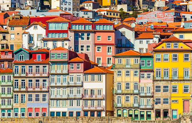 Old historical houses of Porto. Rows of colorful buildings in the traditional architectural style, Portugal.